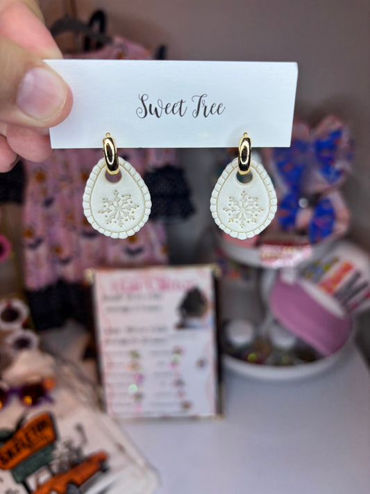 Snowflake huggie earrings - handmade polymer clay